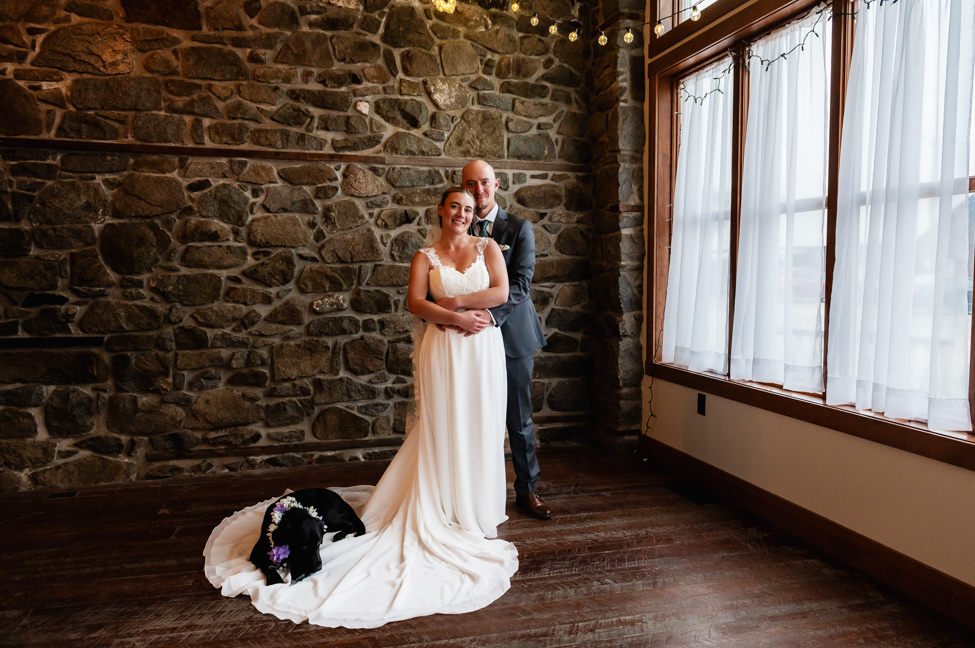 bride and groom with their dog