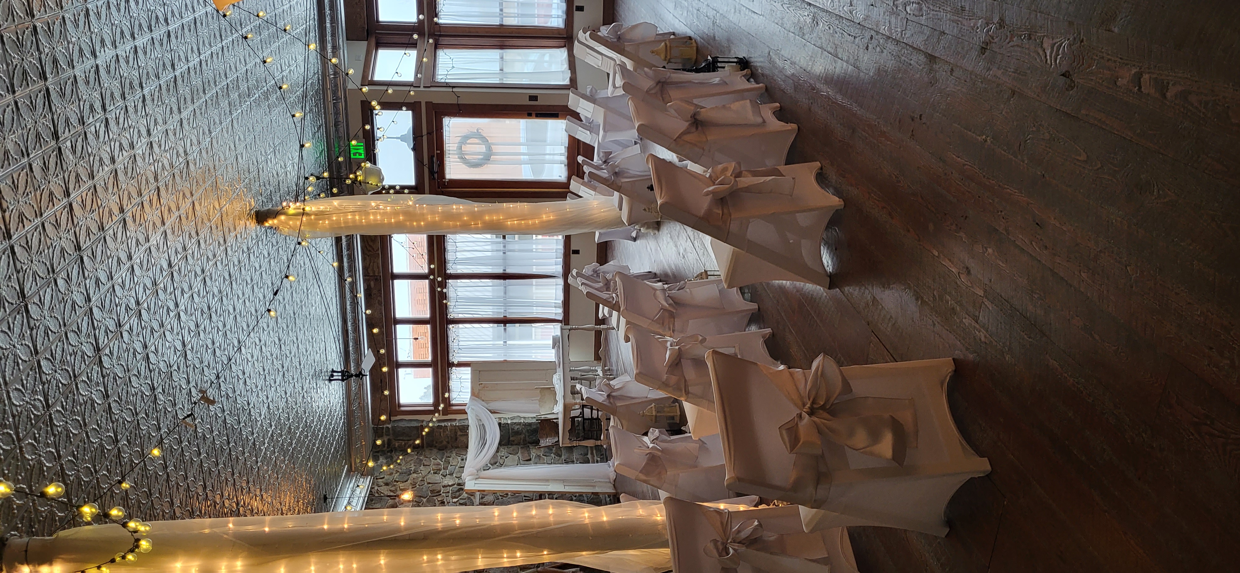 wedding reception white chairs